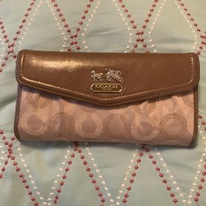 Coach cream and brown signature wallet in great condition.